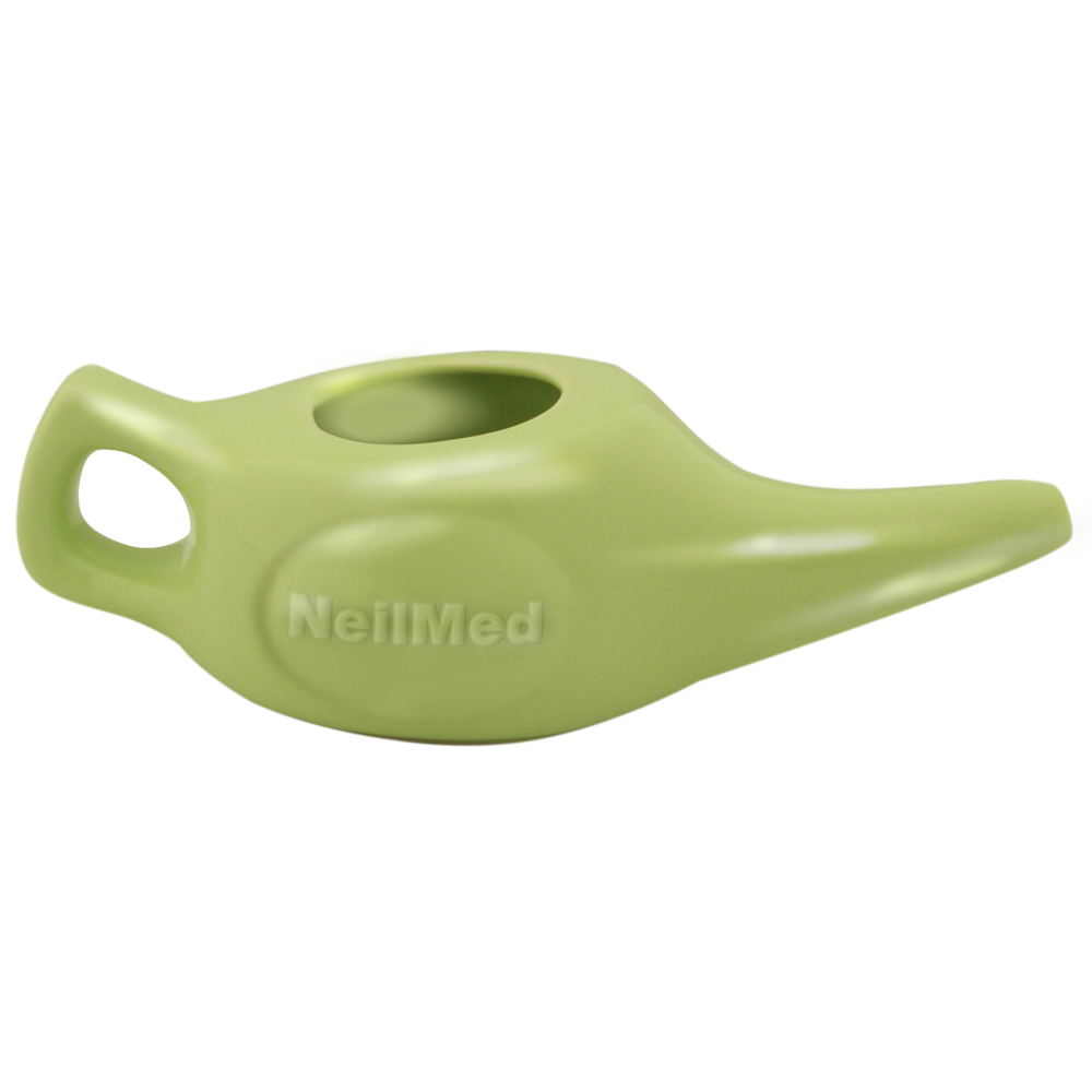 Green neti pot with 'NeilMed' branding on a white background