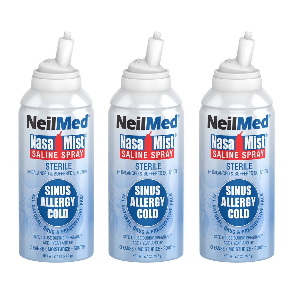 Three bottles of NeilMed NasaMist Saline Spray on a white background
