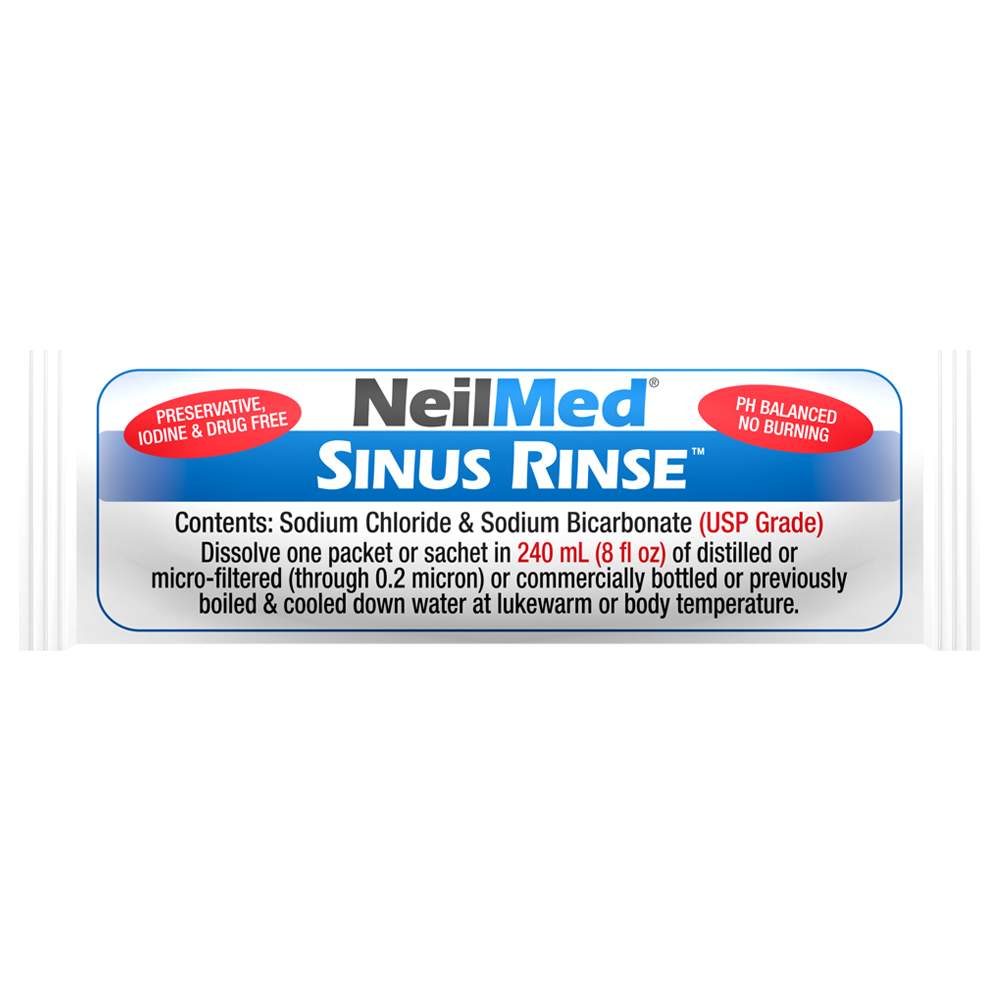 NeilMed Sinus Rinse saline packet labeled preservative, iodine, and drug free, with instructions to dissolve contents in 240 ml of distilled or boiled water.